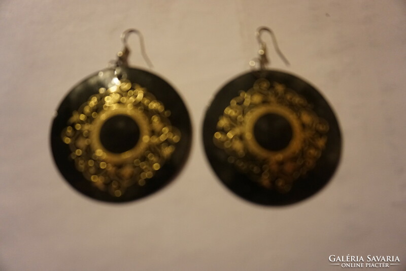 Decorative, gold-patterned earrings made of polymer / fimo / material are for sale.