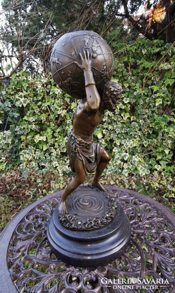 Atlas - mythological bronze statue