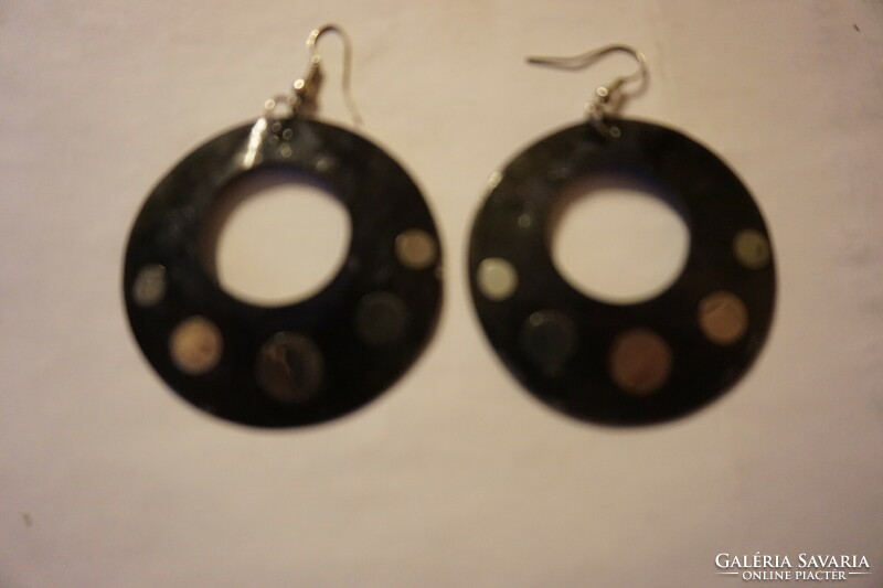 Dangling earrings made of polymer / fimo / material decorated with dots are for sale.