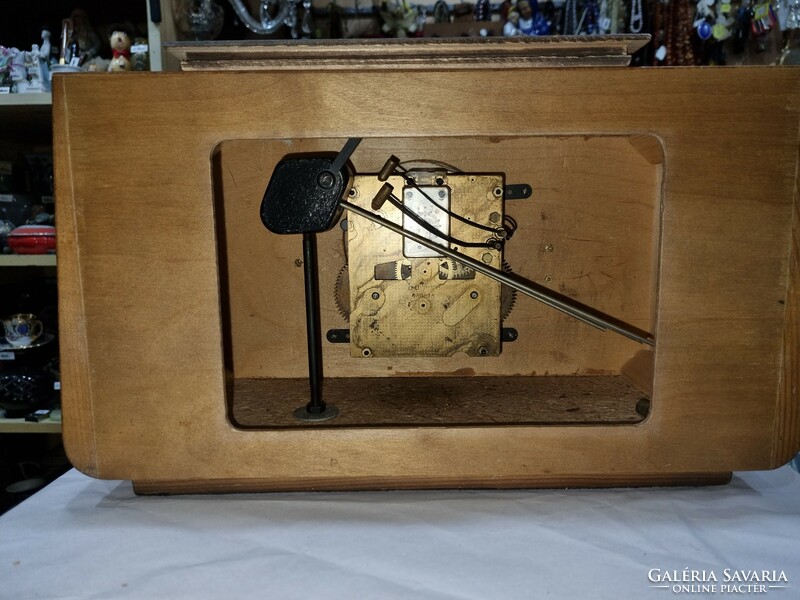 Old wooden fireplace clock