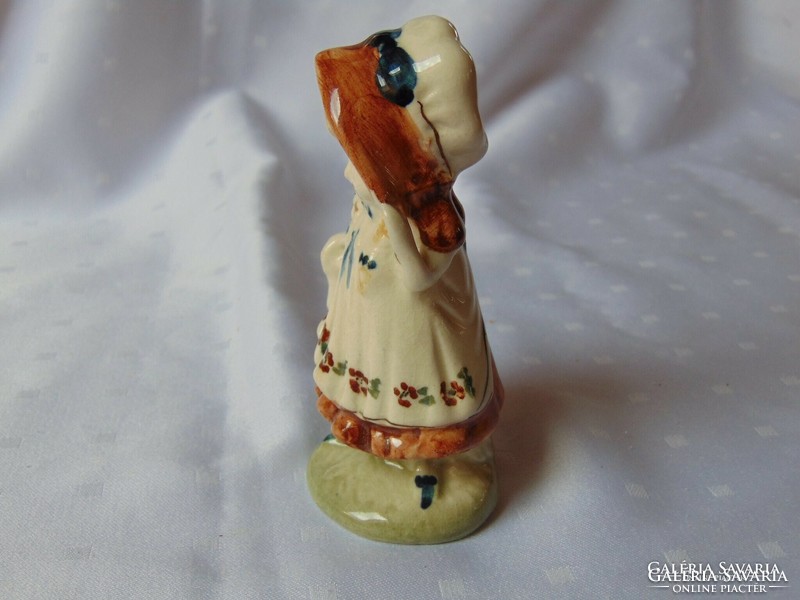 1165- Charming little girl with a ceramic hat