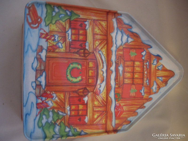 Christmas Santa Claus fackelmann in metal box with gingerbread house