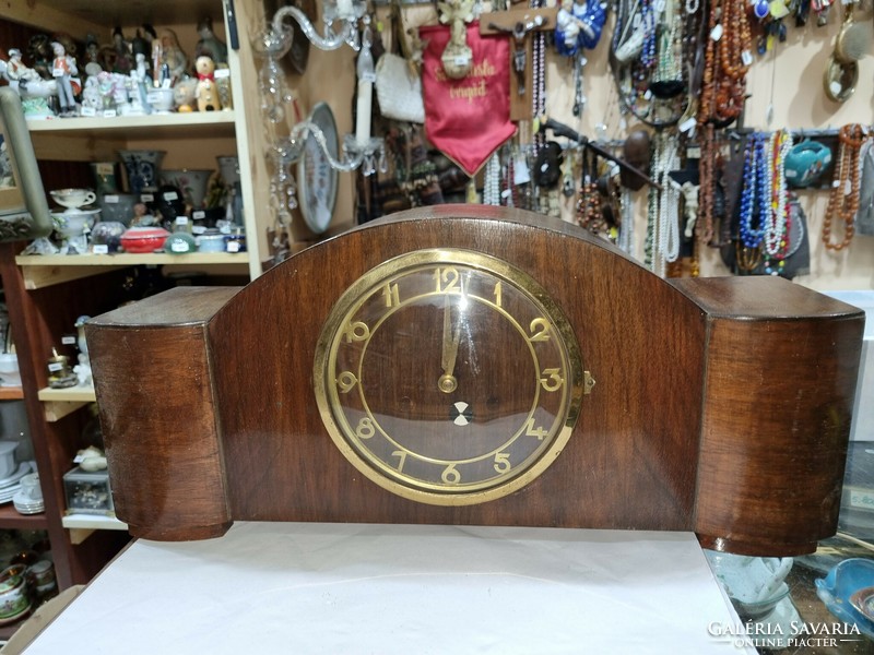 Old wooden fireplace clock
