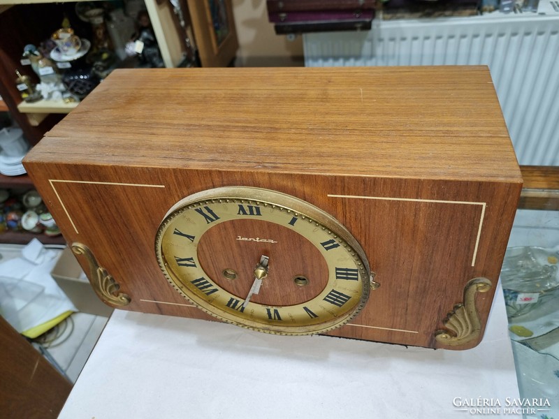 Old wooden fireplace clock