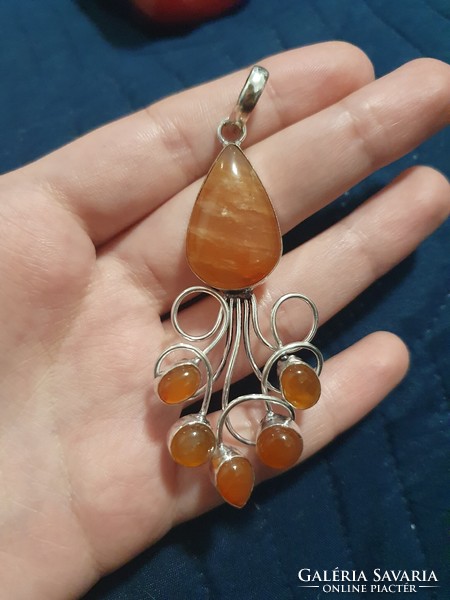 A wonderful carnelian pendant set in silver, in a unique style