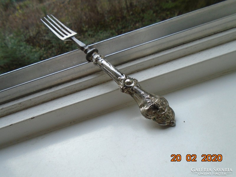 Antique baroque fork with silver handle