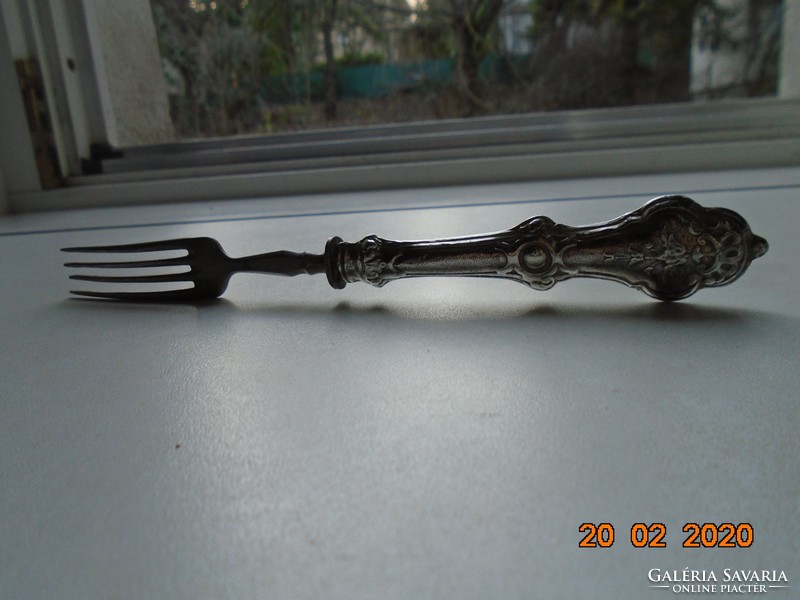 Antique baroque fork with silver handle