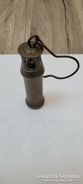 Old copper mini mining lamp, carbide lamp.