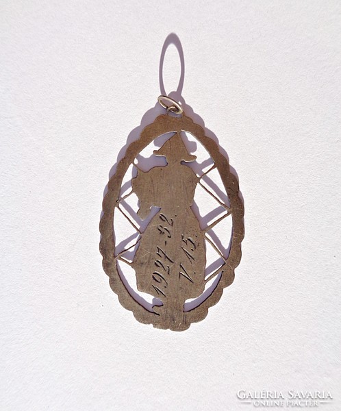 Old openwork pattern, sawn, silver pendant with a lady pattern