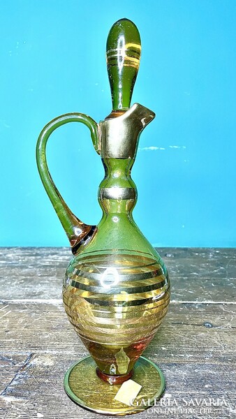 Retro, vintage gold-painted glass jug