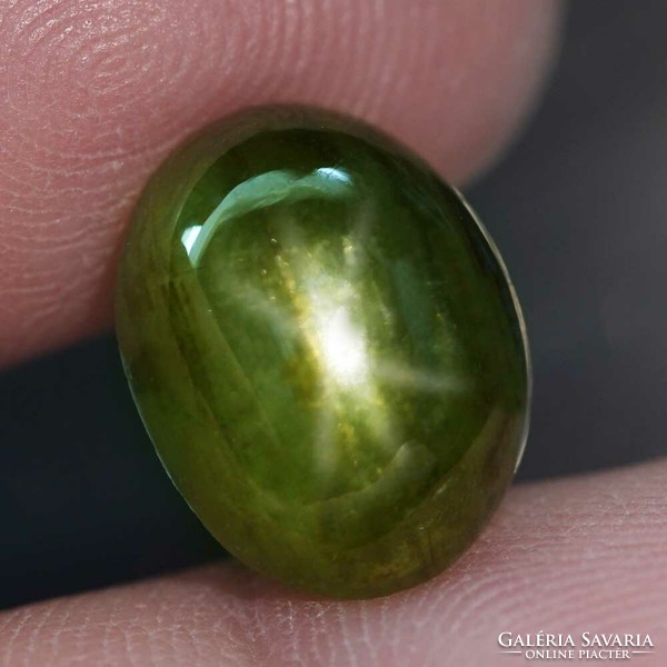 Rarity! 9.04 Ct. Unheated natural green star sapphire, oval cabochon