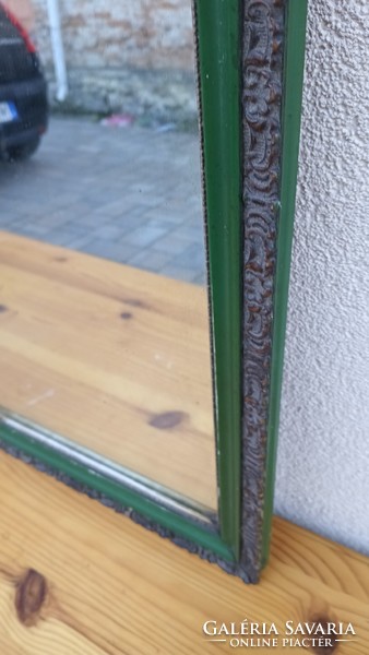 Wall mirror in antique green frame. Negotiable!