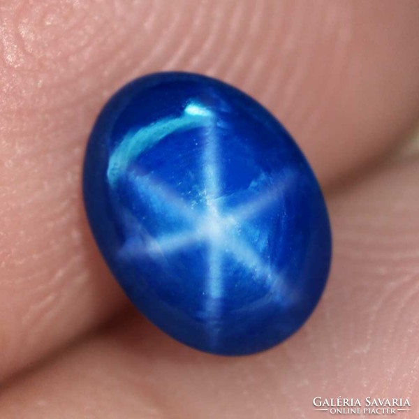 1.29 Ct. Natural 6-ray star sapphire, deep blue oval cabochon
