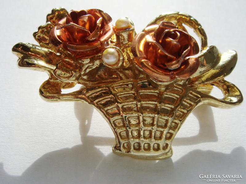 Old women's brooch with vintage metal badge