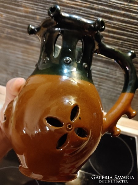 A beautiful, rare folk art openwork jug
