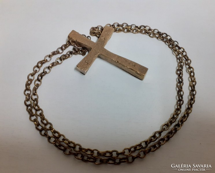 Old applied art bronze cross pendant on a chain