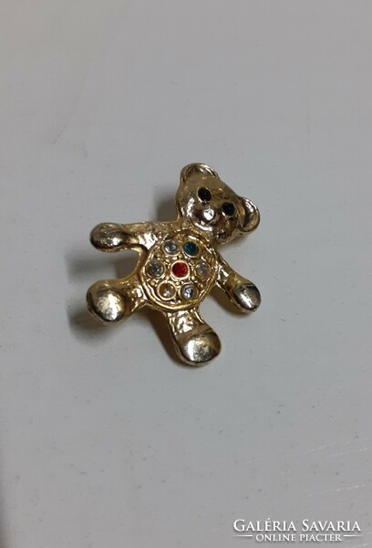 Gold-plated teddy bear brooch in good condition, studded with small stones