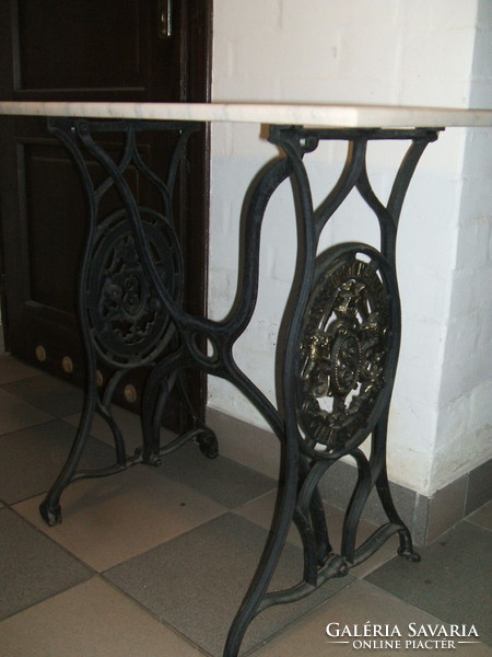 Console table made of antique sewing machine legs