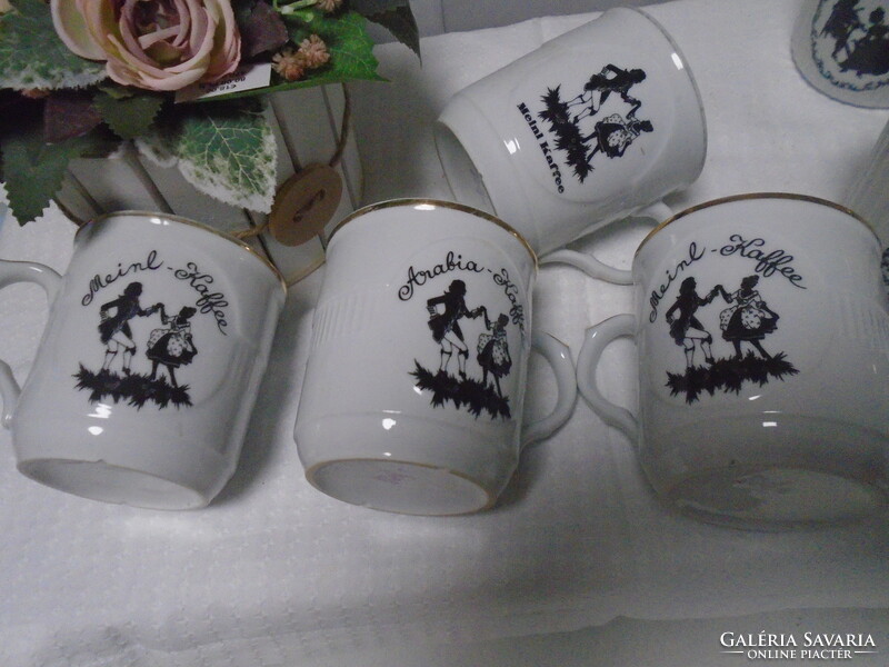 Arabica and mozart coffee mugs with rococo motifs are flawless old pieces