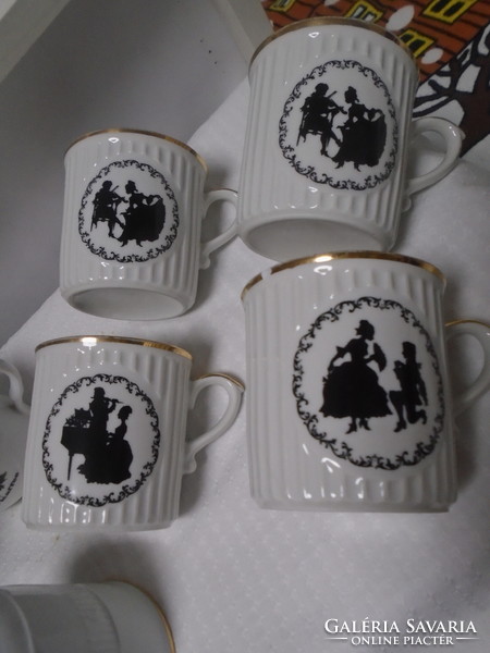 Arabica and mozart coffee mugs with rococo motifs are flawless old pieces
