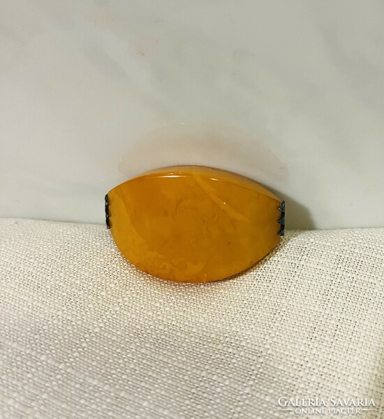Amber brooch with silver socket