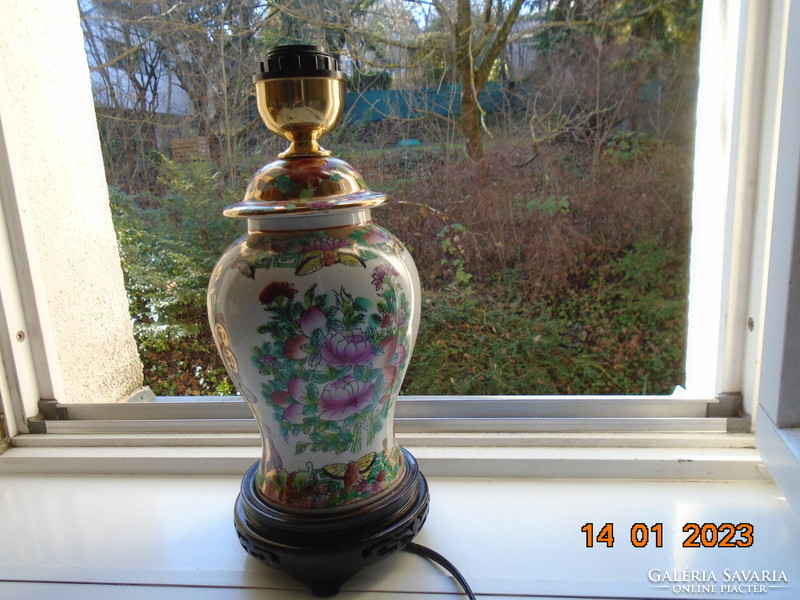 Hand-painted famille rose Chinese lamp with rich gilding, lacquered wood base