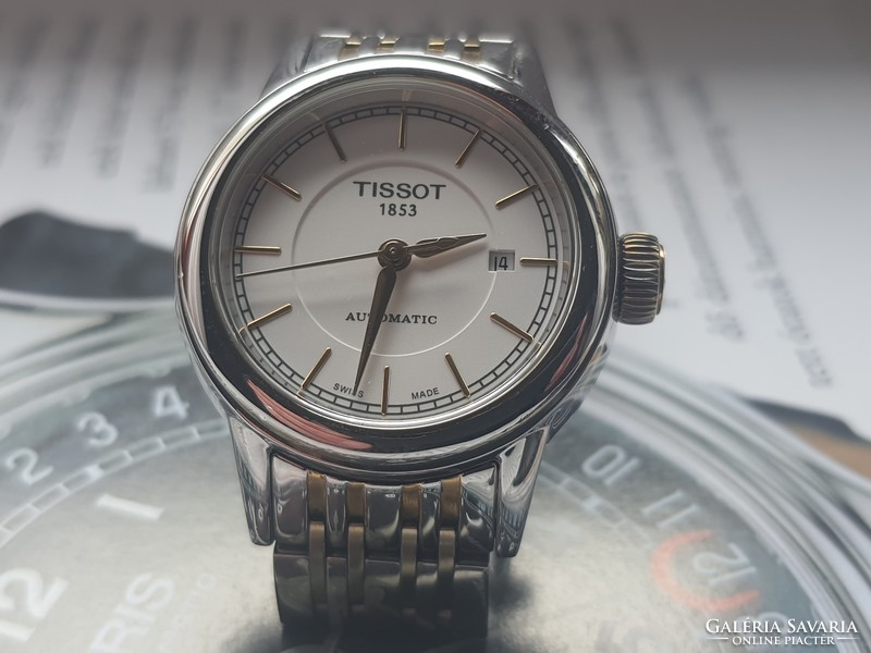 The watch is a Swiss and automatic women's tissot wristwatch