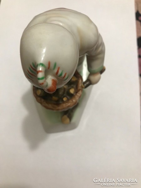 Zsolnay porcelain figure. Little boy collecting wood and embers. In undamaged condition.
