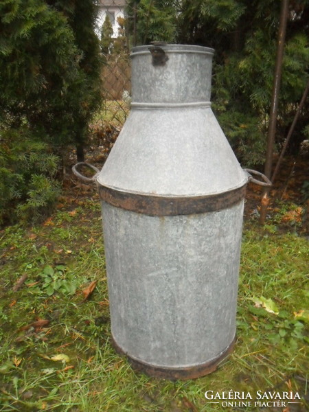 Old large galvanized milk or water jug
