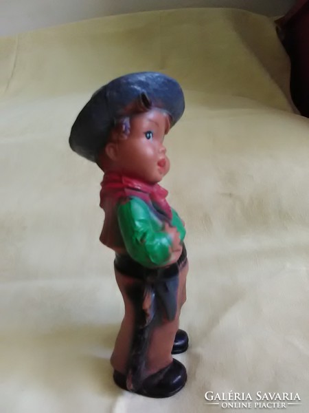 Old rubber toy little cowboy whistling rubber figure