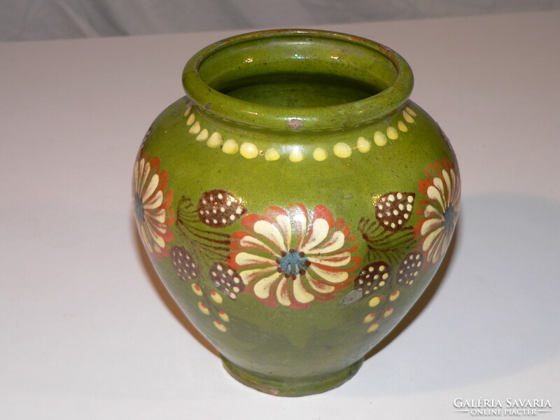A painted-glazed ceramic vase with flower pattern decoration is for sale at a low price