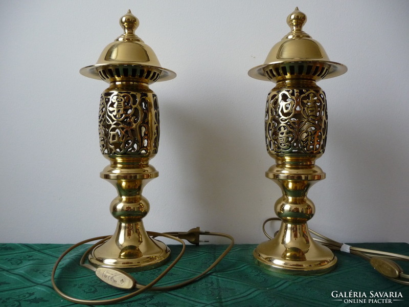 A pair of Chinese Far Eastern style copper table lamps