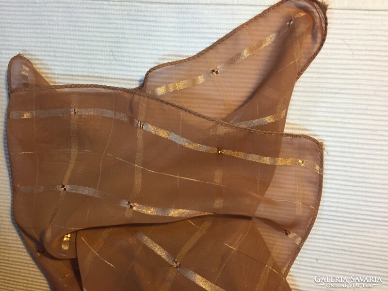 Elegant brown shawl made of thin synthetic material