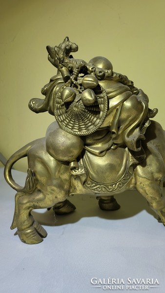Oriental antique copper statue of Laozi (lao ce) sitting on a bull