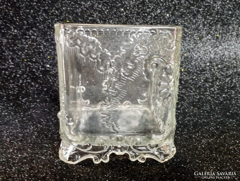 Embossed tabletop glass container