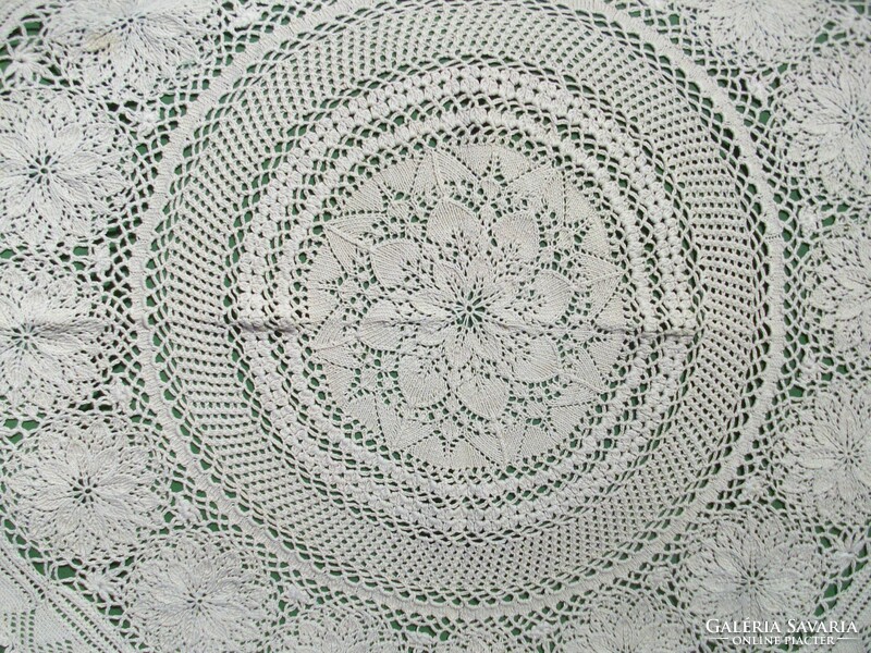 Beautiful needlework: large knitted lace tablecloth 74 cm