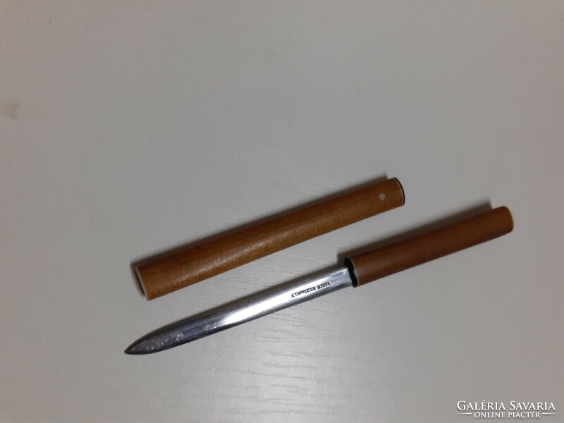 A small tanto leaf opener with bone decoration on the end of the knife