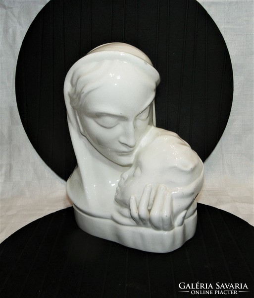 A rare old craftswoman - Madonna with her child