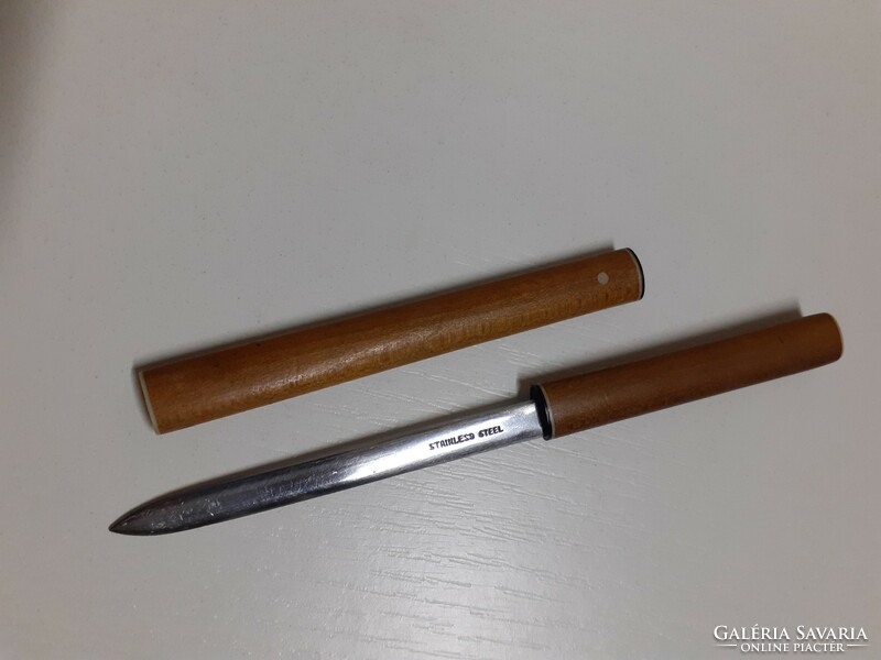 A small tanto leaf opener with bone decoration on the end of the knife