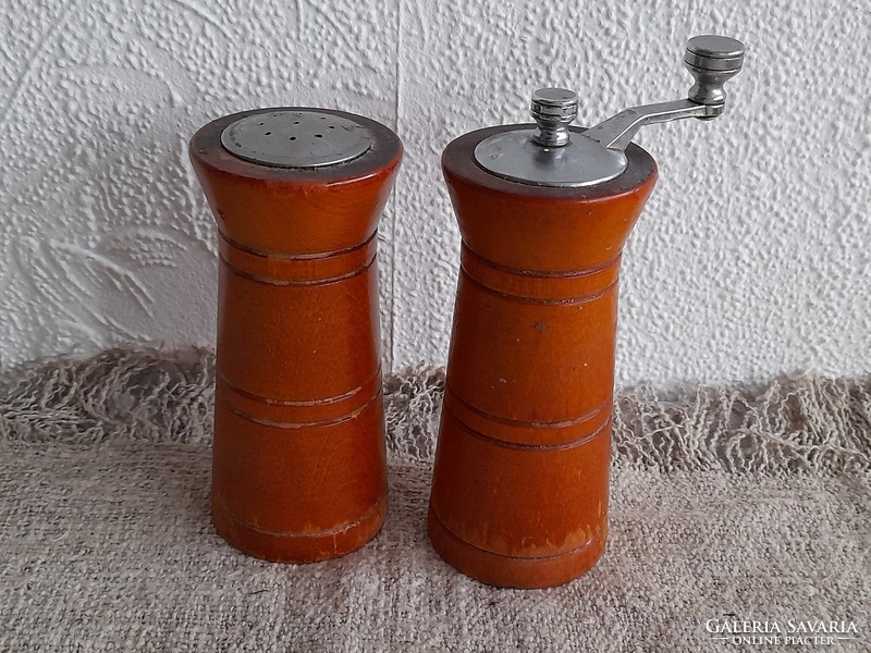 Old wooden salt shaker and wine press