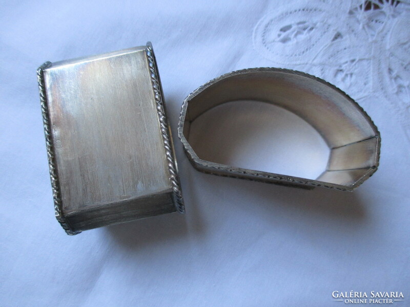 Pair of antique silver napkin rings with a gold medallion