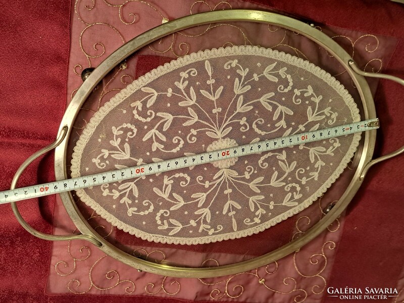 Oval glass tray in a metal frame