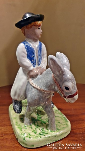 Izsépy ceramic, a boy on a donkey, on a donkey's back, with a dog, flawless, foal boy figure.