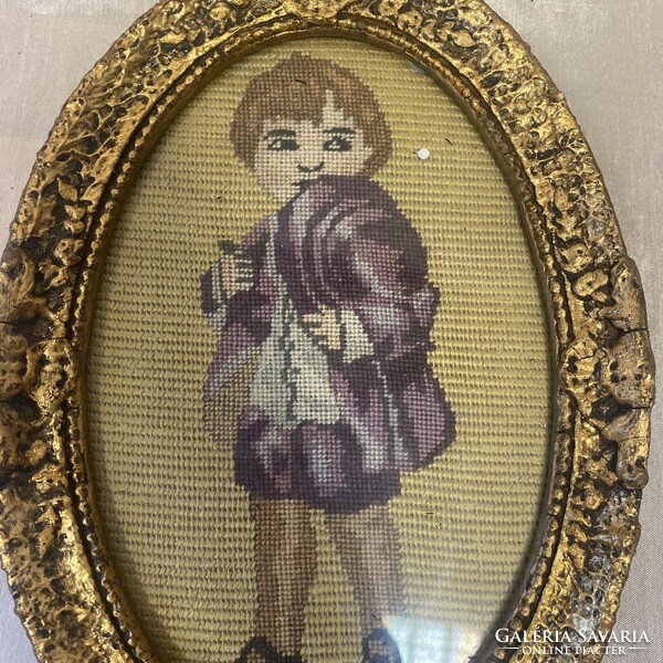 Small antique frame with needle tapestry