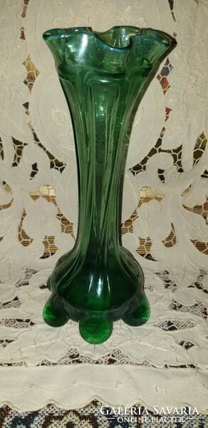 Old torn glass vase