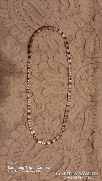 Rózsaaranyozott( vastagon aranyozott aranyhatásu ) vésettmintás ezüst ,elegáns viselet