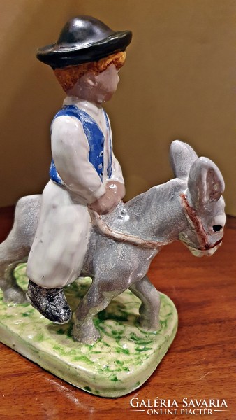Izsépy ceramic, a boy on a donkey, on a donkey's back, with a dog, flawless, foal boy figure.