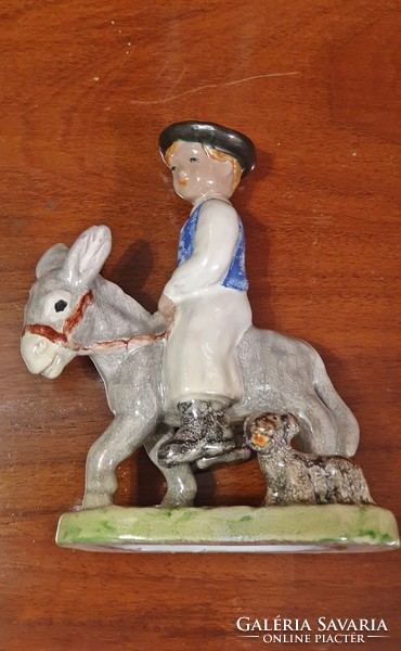 Izsépy ceramic, a boy on a donkey, on a donkey's back, with a dog, flawless, foal boy figure.