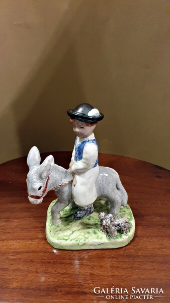 Izsépy ceramic, a boy on a donkey, on a donkey's back, with a dog, flawless, foal boy figure.