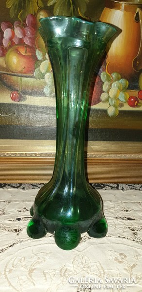 Old torn glass vase